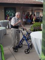 Ira gives a toast to the ladies